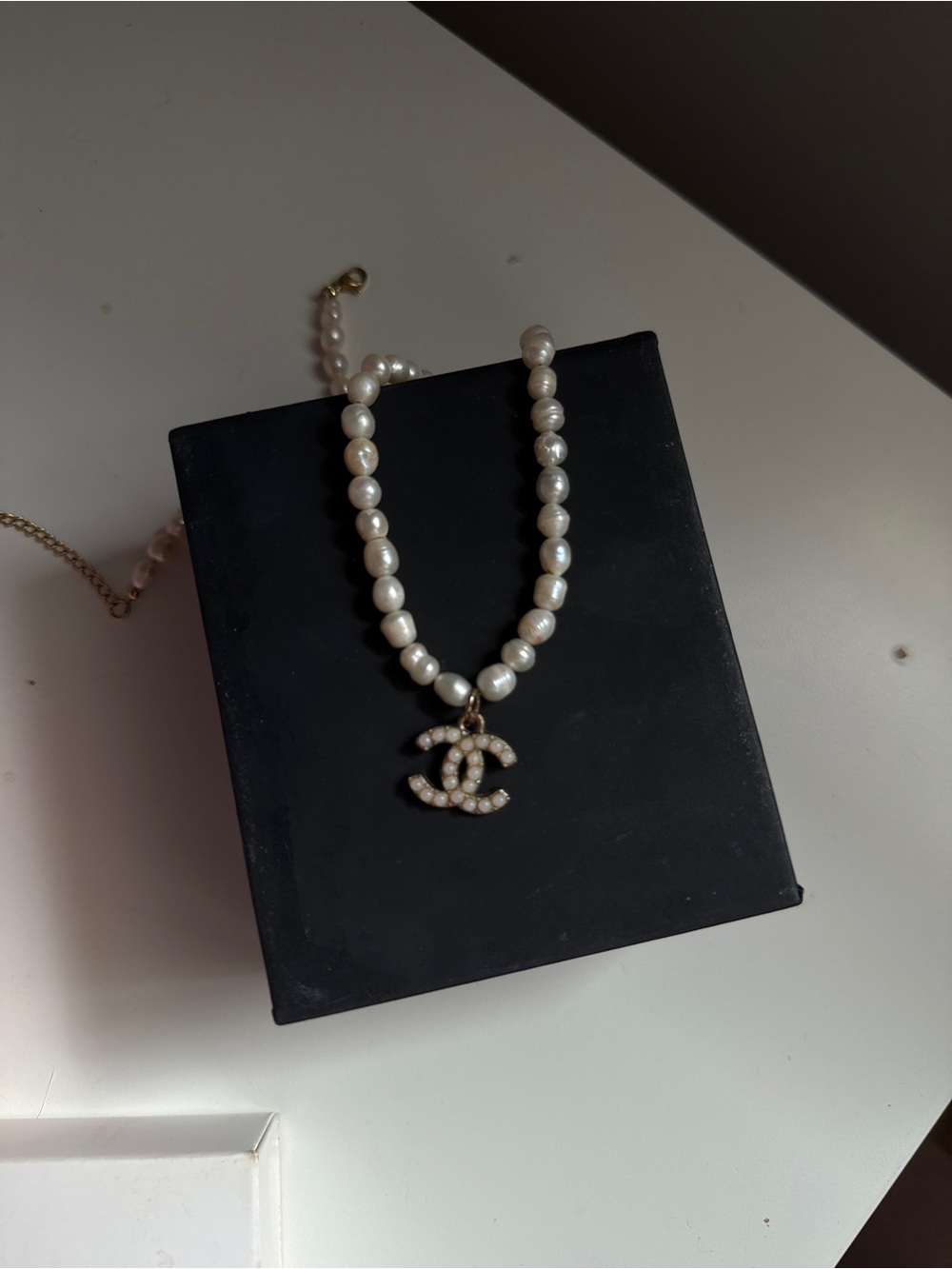 CHANEL Pearl Necklace with Gold-Tone Crystal Double C Logo